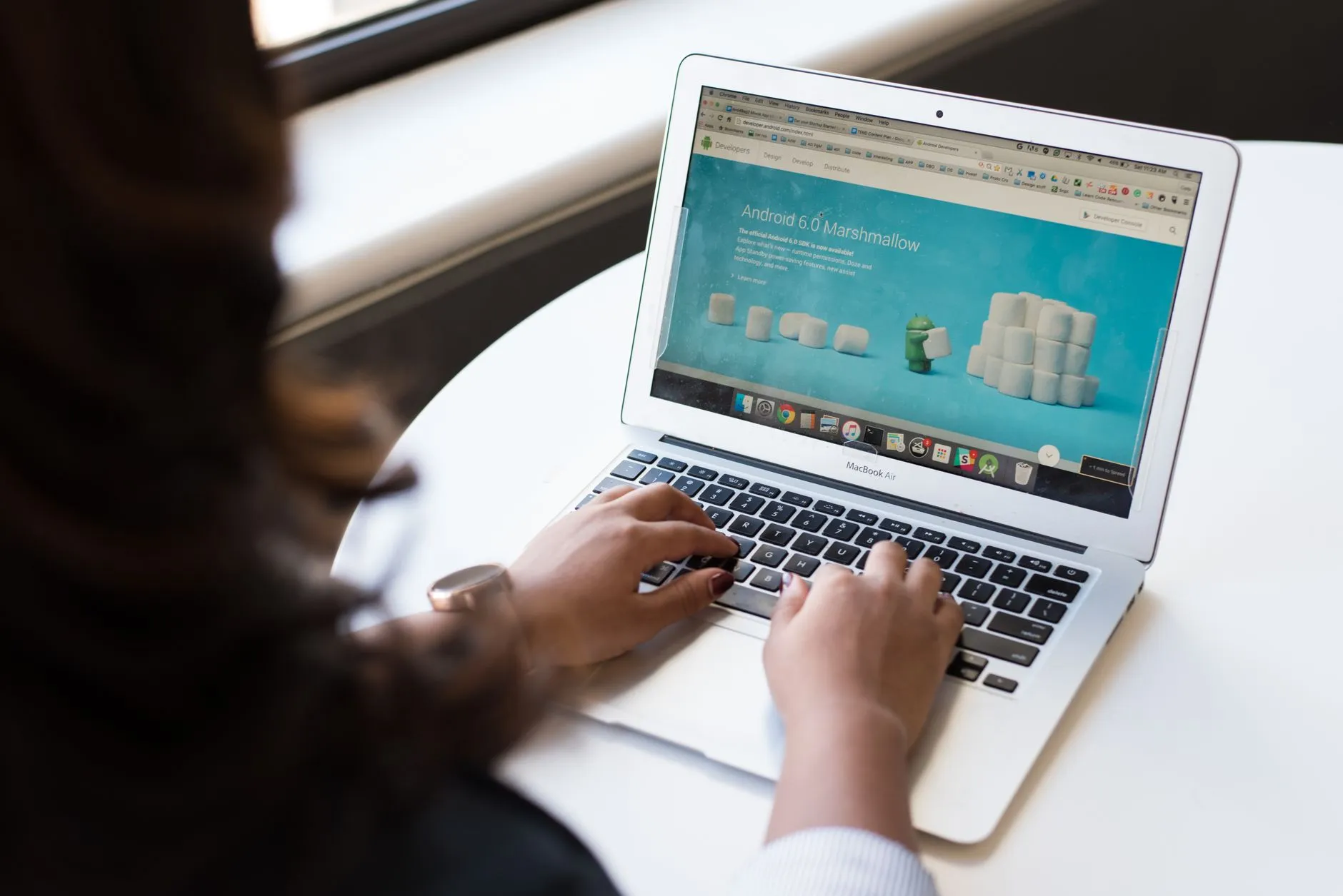 Person using a laptop to inspect a website
